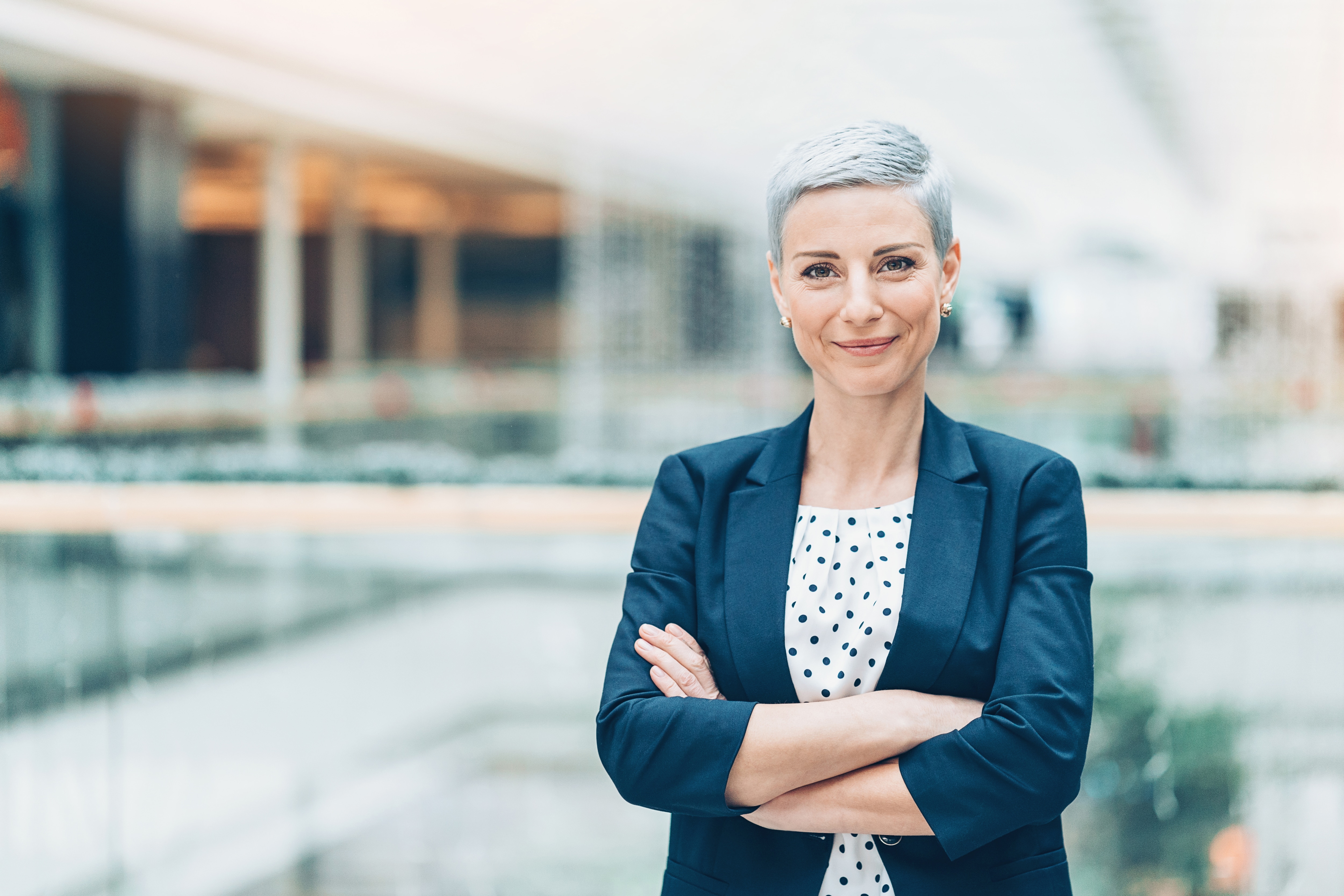 a woman in blue blazer 