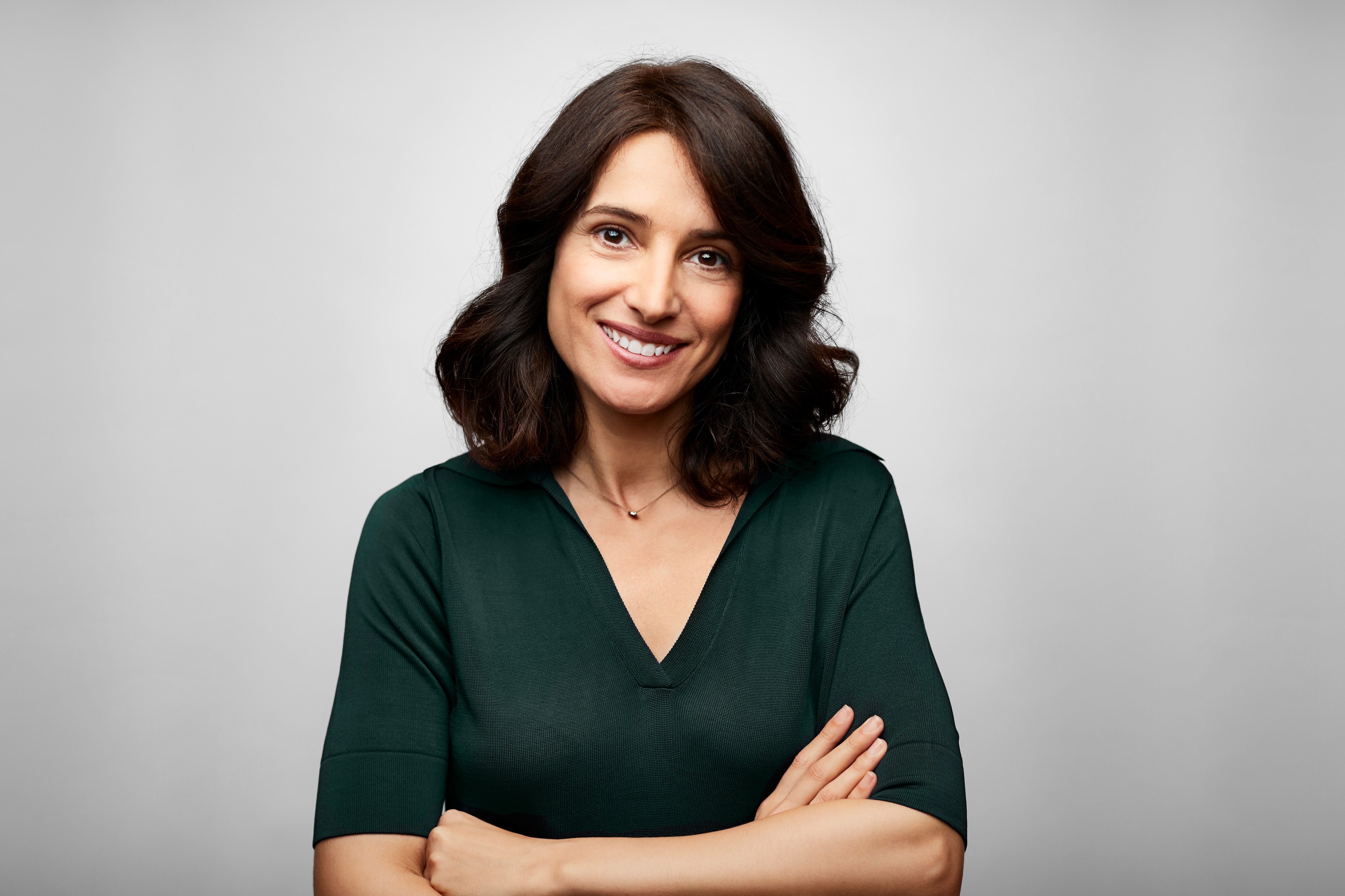 a woman in green blouse