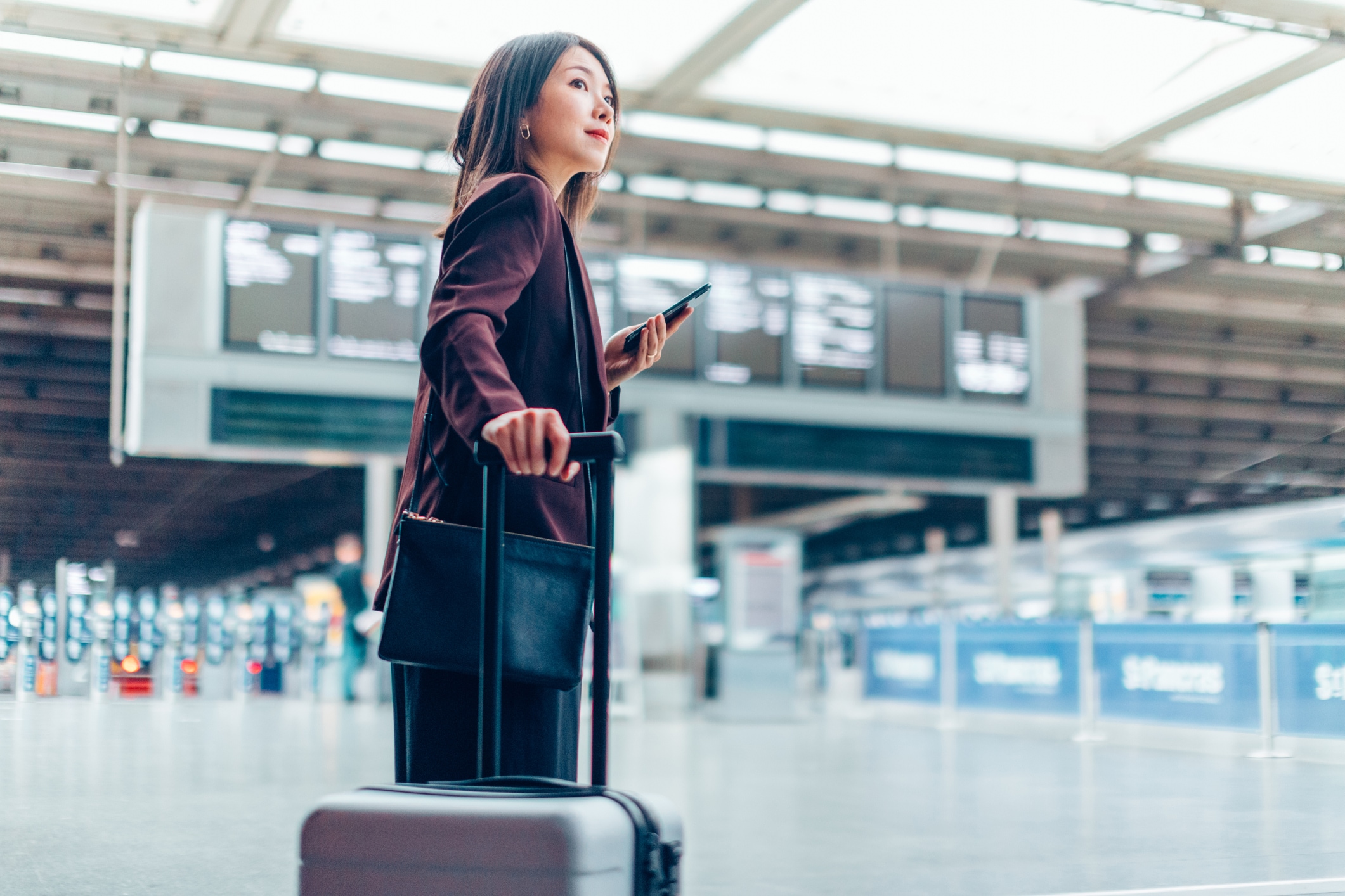 female business traveler in airport