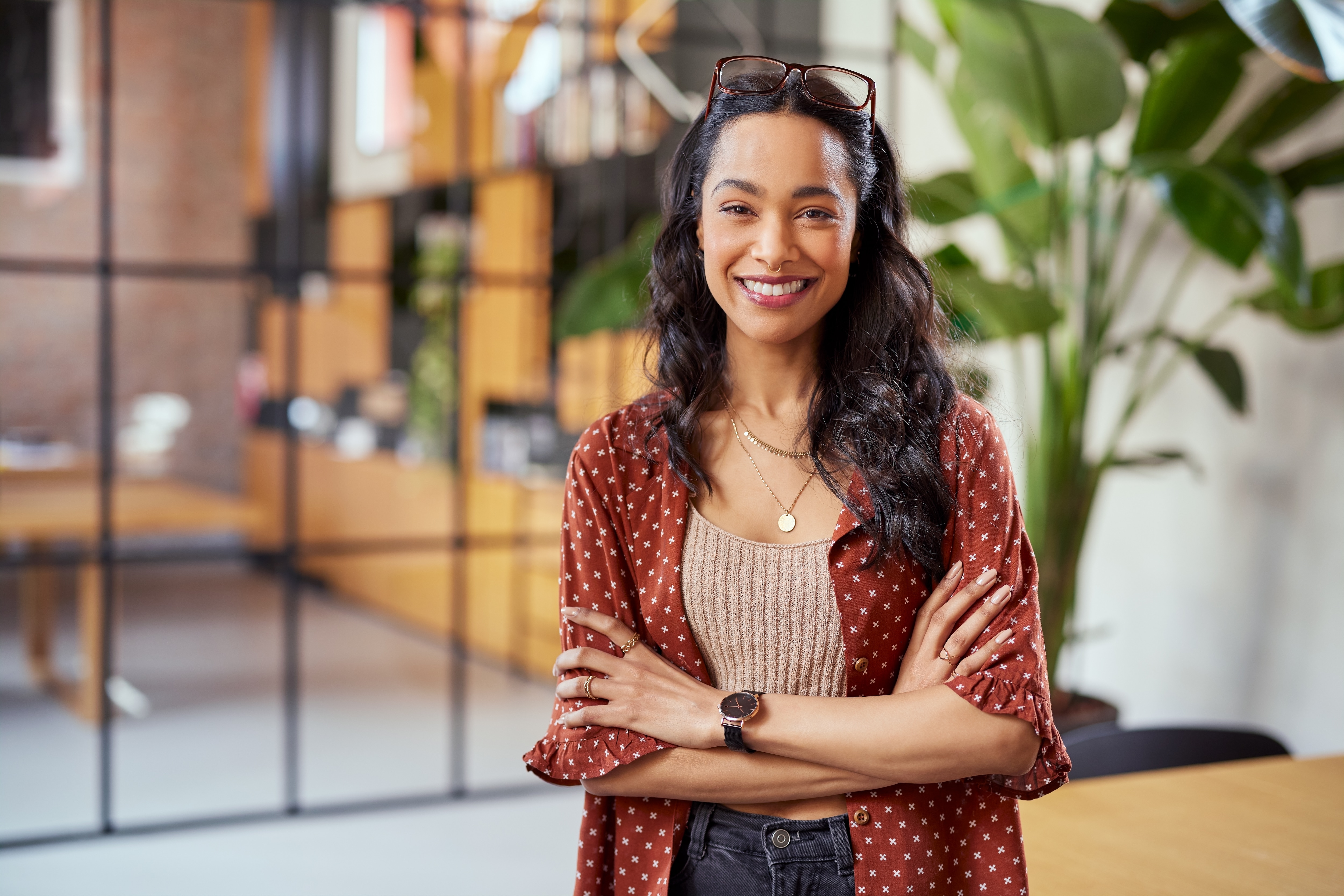 a woman with smile looking at the camera