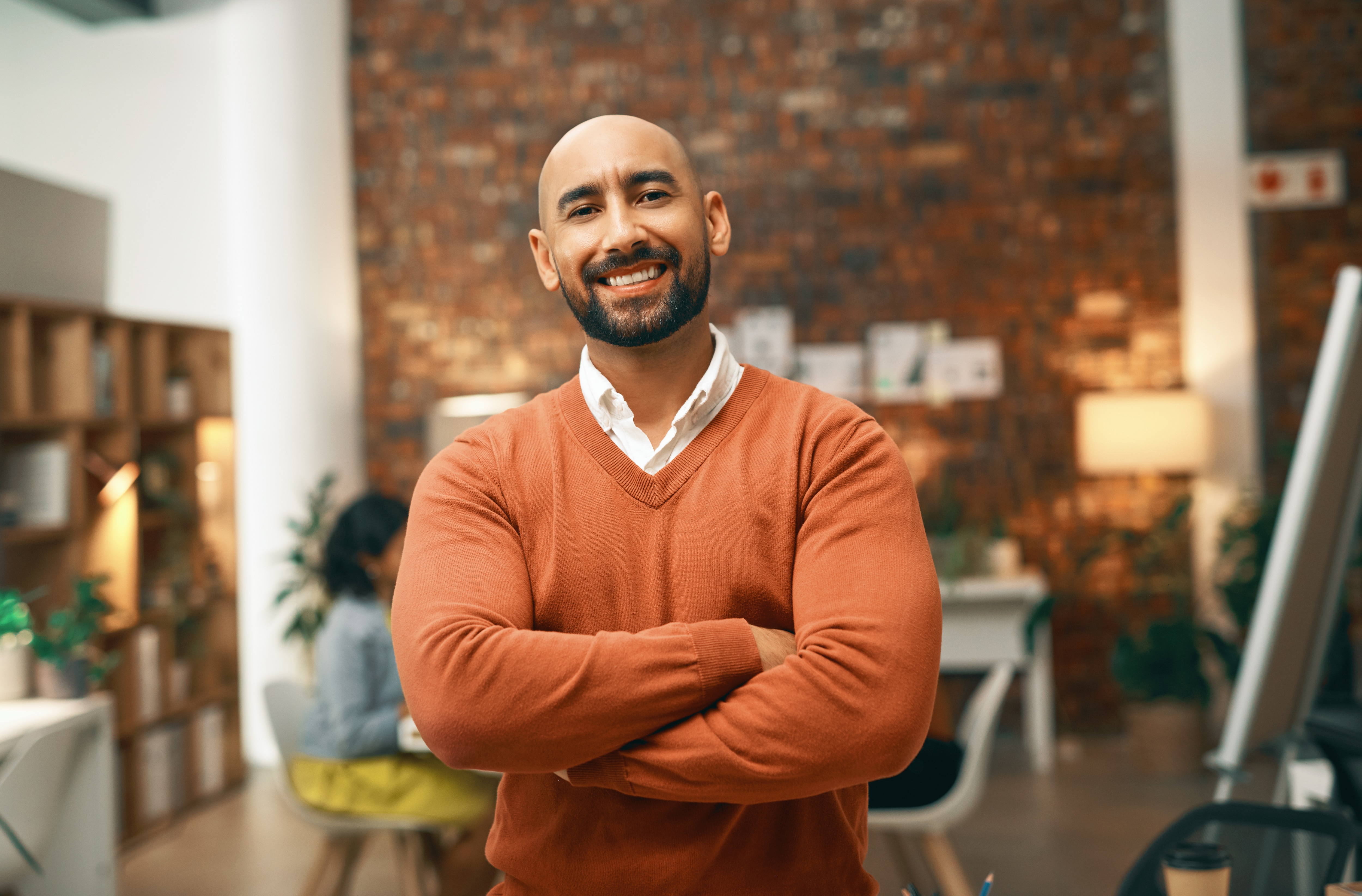 a man with smile looking at the camera 