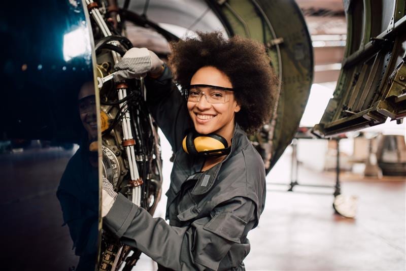 aerospace and defense worker smiling 