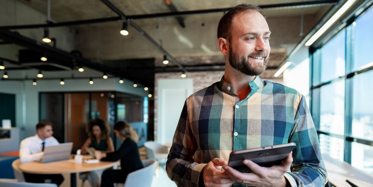 man holding a tablet