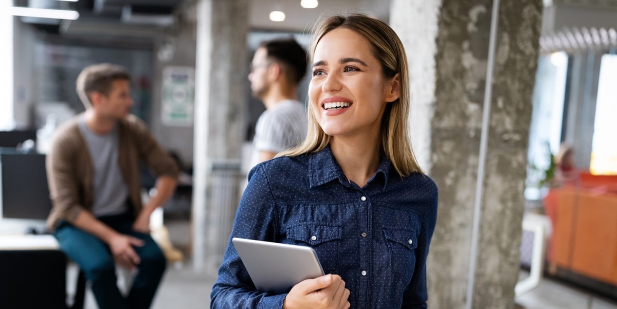 woman holding iPad