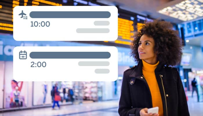 woman using mobile phone in airport